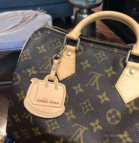 does Lv stores engrave purses